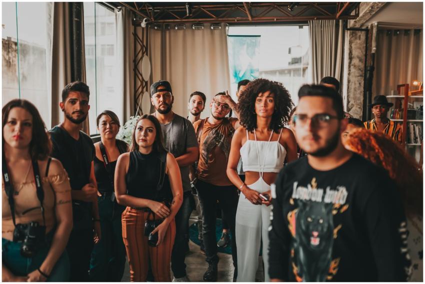 Vibrant and diverse group gathering at an indoor e