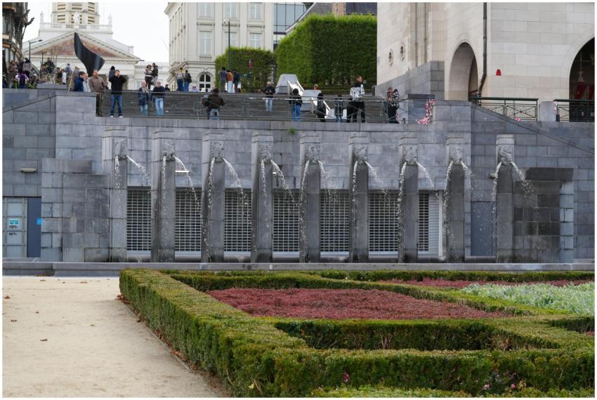Visitors enjoy the scenic Mont des Arts fountains