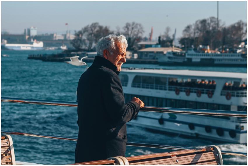Elderly man on a ferry in Istanbul, enjoying the s