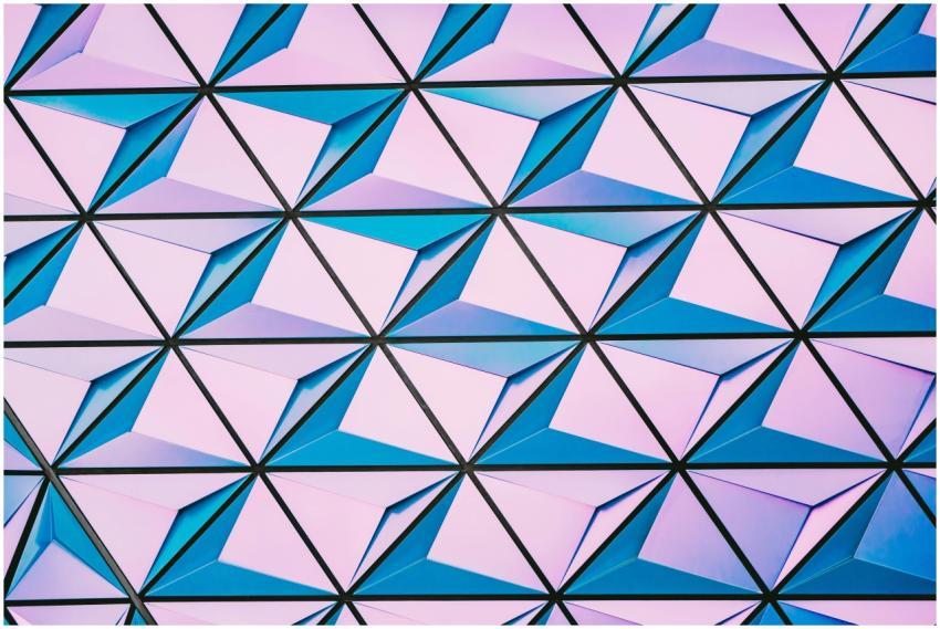 A vibrant triangular pattern with shades of pink a