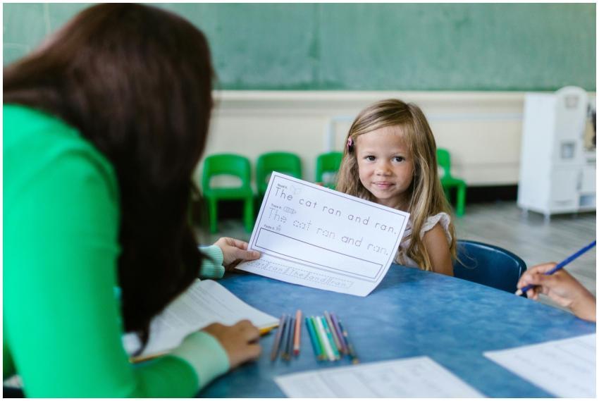 A young girl participates in an engaging classroom