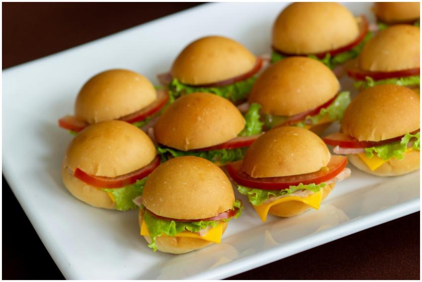 Tasty mini sliders with lettuce, tomato, and chees