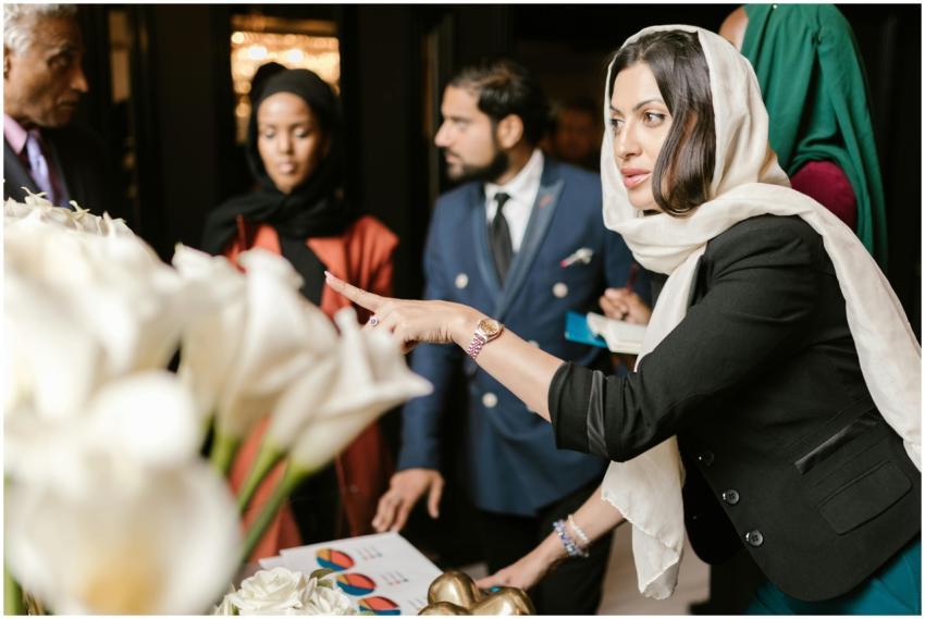 Business professionals having a discussion with ch