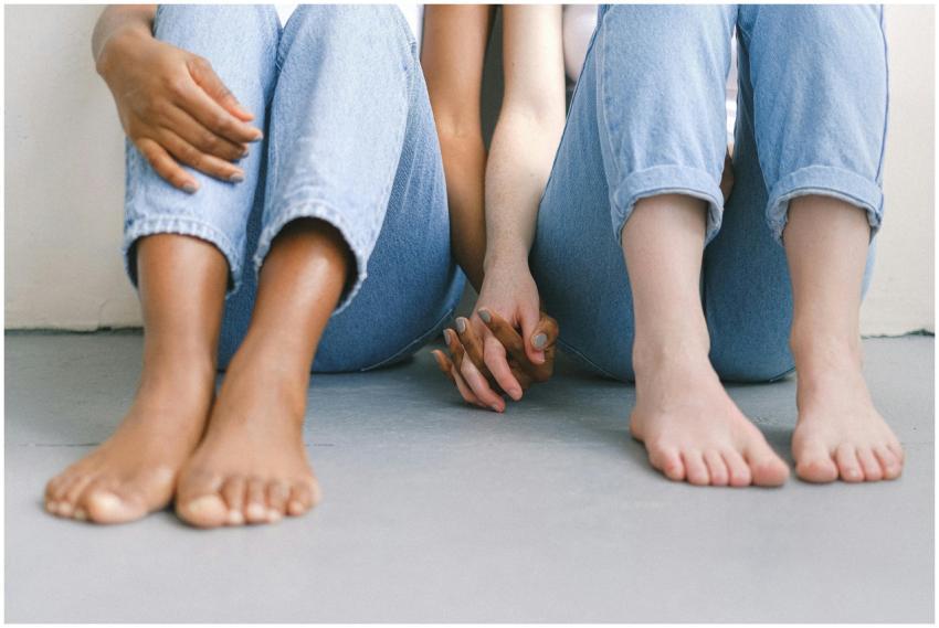 Close-up of an interracial couple holding hands, s
