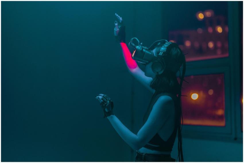 A woman interacts with a virtual environment using