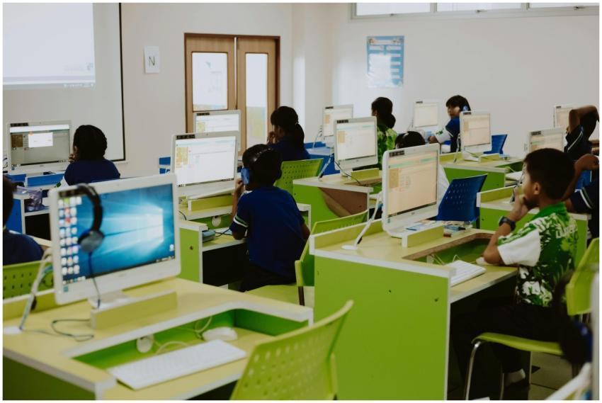 Children learning in a modern computer lab environ