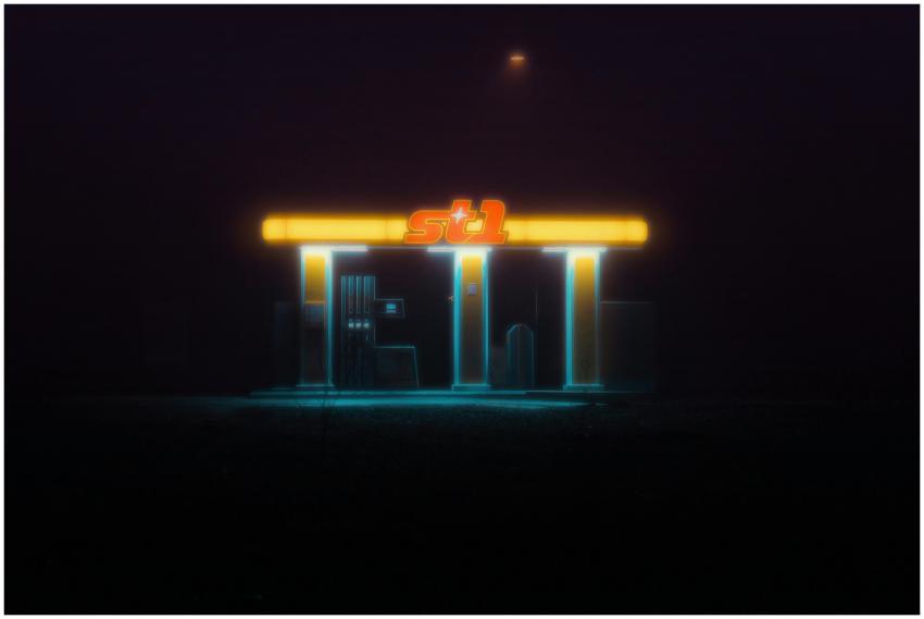 A glowing neon-lit gas station creating a mysterio