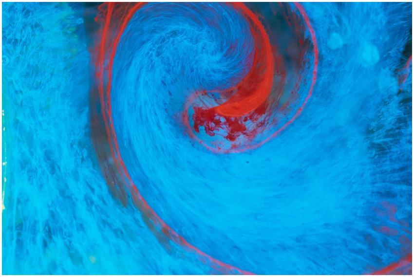 Dynamic abstract swirl of blue and red colors, res