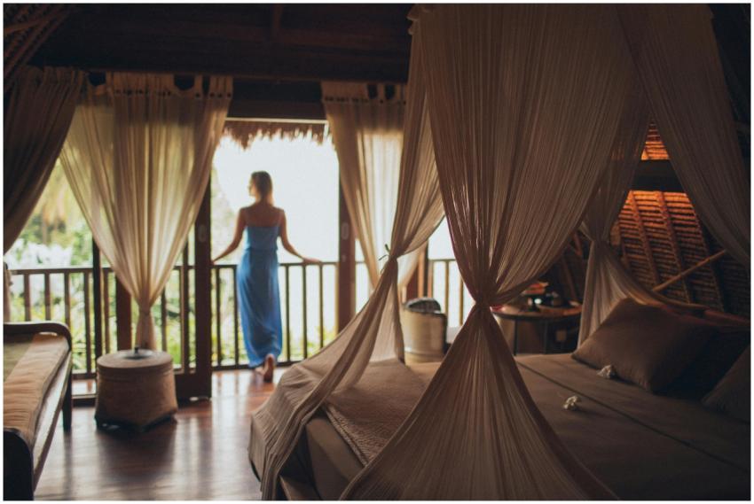 Peaceful bedroom in tropical villa with balcony vi