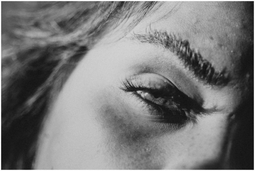 Intense black and white close-up of a woman's eye