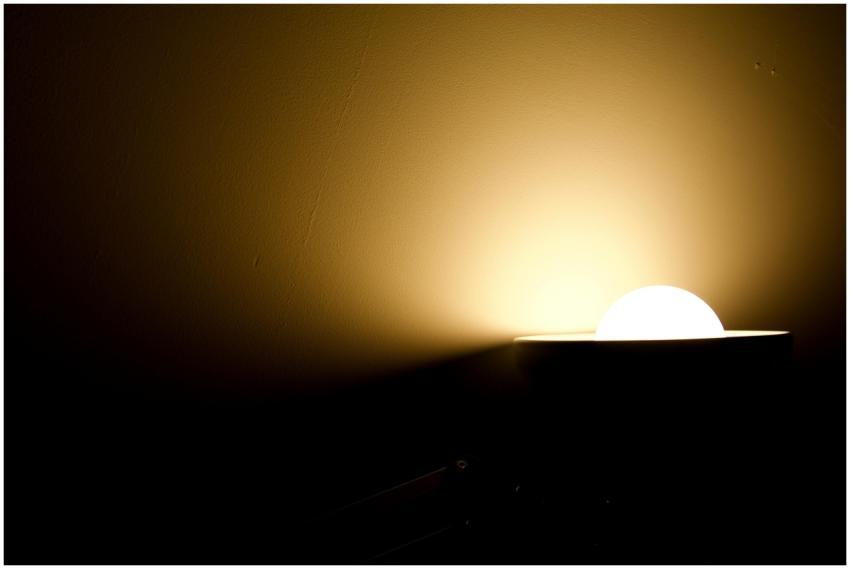 Abstract photo of a glowing lamp casting light on