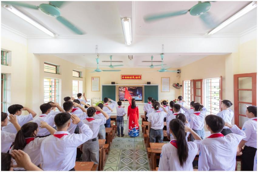 A dynamic classroom scene with students engaged in
