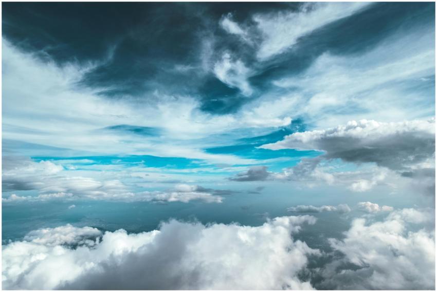 Majestic clouds and vibrant blue sky create a stun