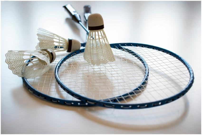 Vibrant image of badminton rackets and shuttlecock