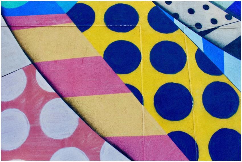 Vibrant geometric wall mural with bold colors and