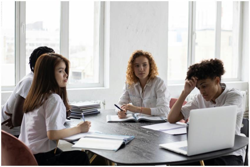 Focused young multiracial coworkers in formal clot