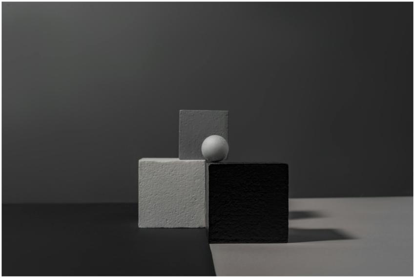 A minimalist still life featuring geometric blocks