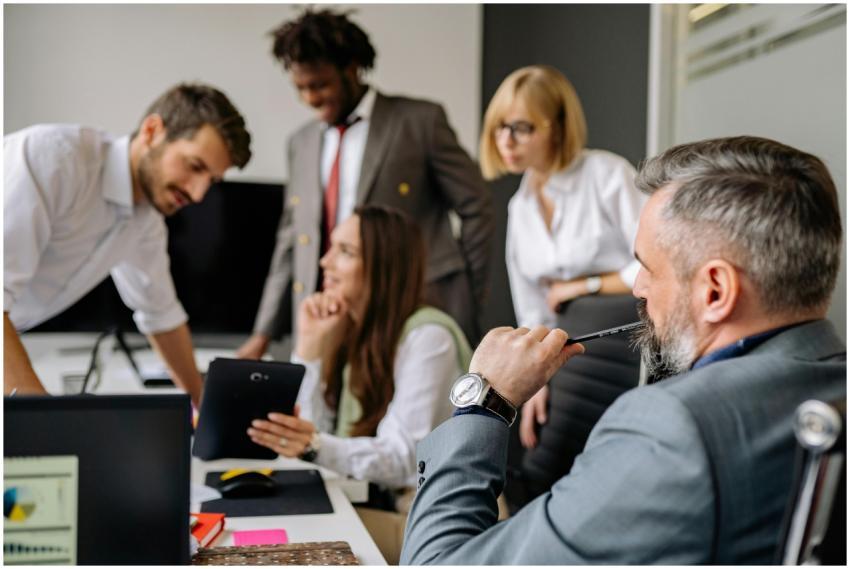 A diverse group of professionals engaging in a col