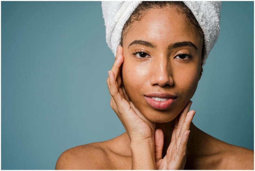 Calm African American female with towel turban on