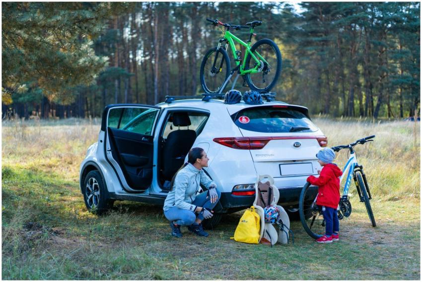Mother and child preparing for a cycling adventure