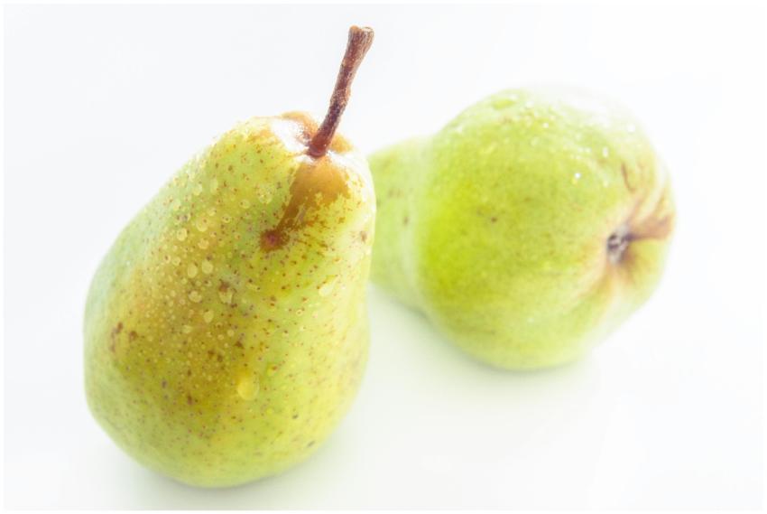 Close-up of fresh, juicy pears with dew drops, sho
