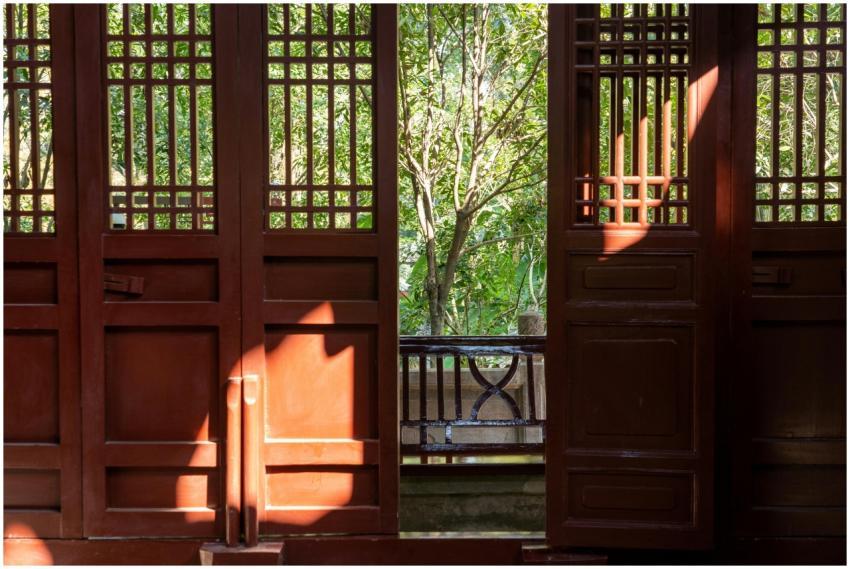 Sunlight streaming through a traditional wooden do