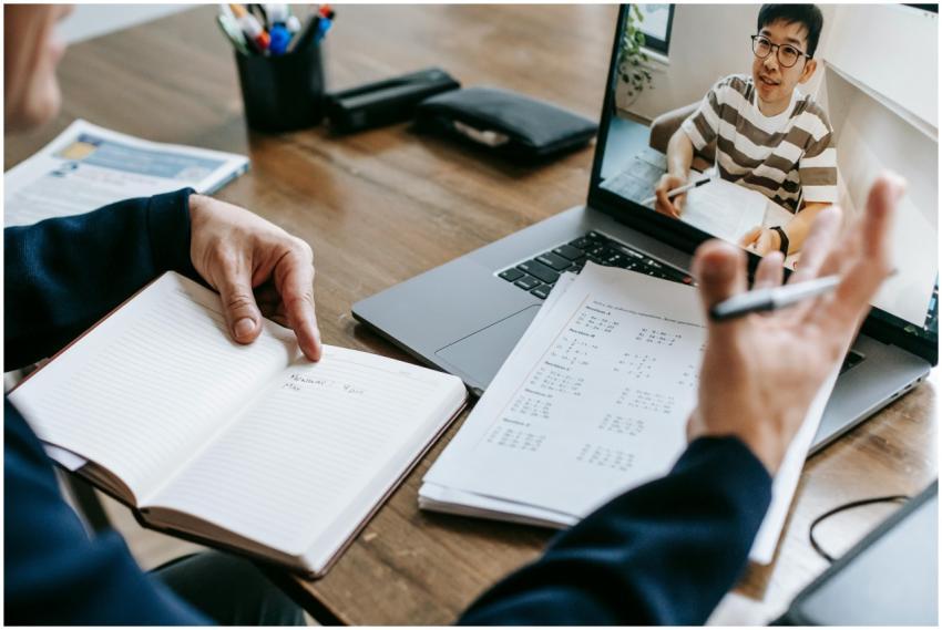 A professional conducting an online class through