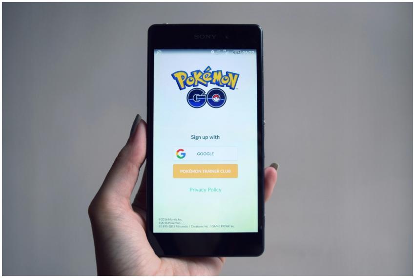 Smartphone displaying Pokémon Go app sign-in scree