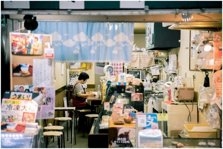 Warm interior of a cozy small shop in Osaka, featu