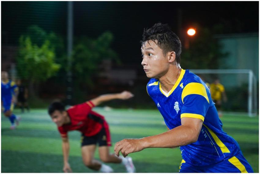 Intense soccer match under night lights, showcasin