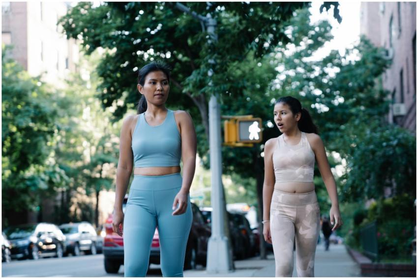 Active lifestyle of a mother and daughter jogging