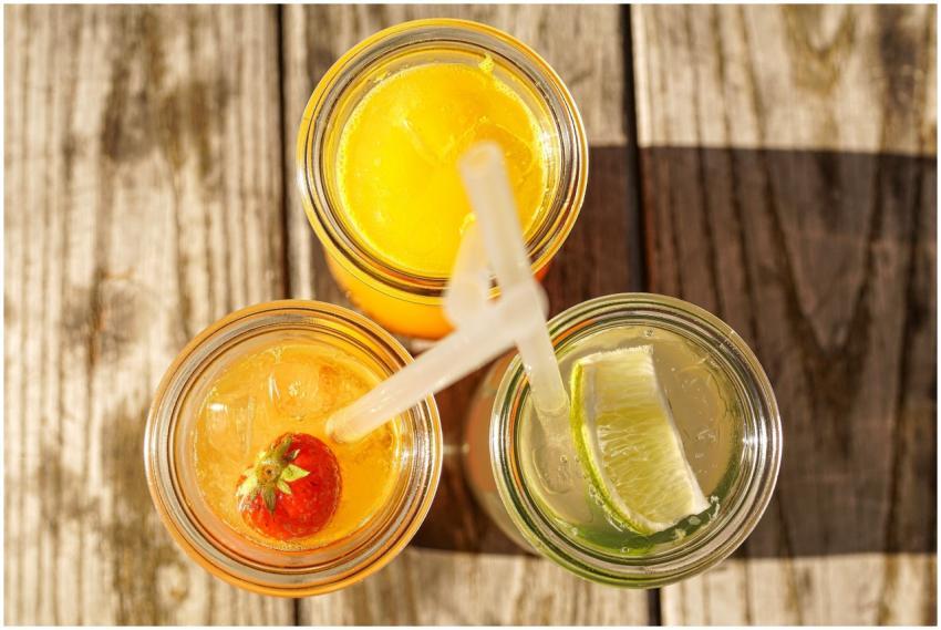 Enjoy top-down view of citrus and strawberry drink
