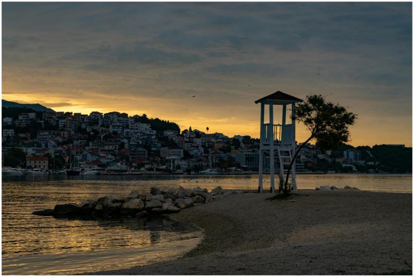 Serene beach scene during sunset in Split, Croatia