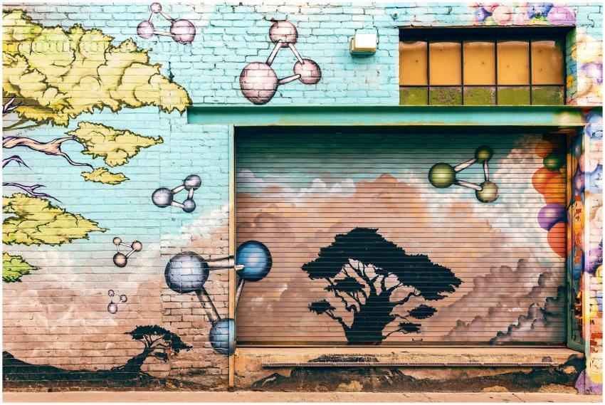 Colorful mural on a brick wall in Pasadena featuri