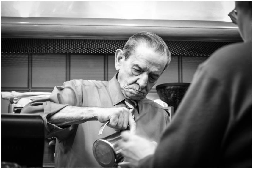 Black and white portrait of an elderly barman prep