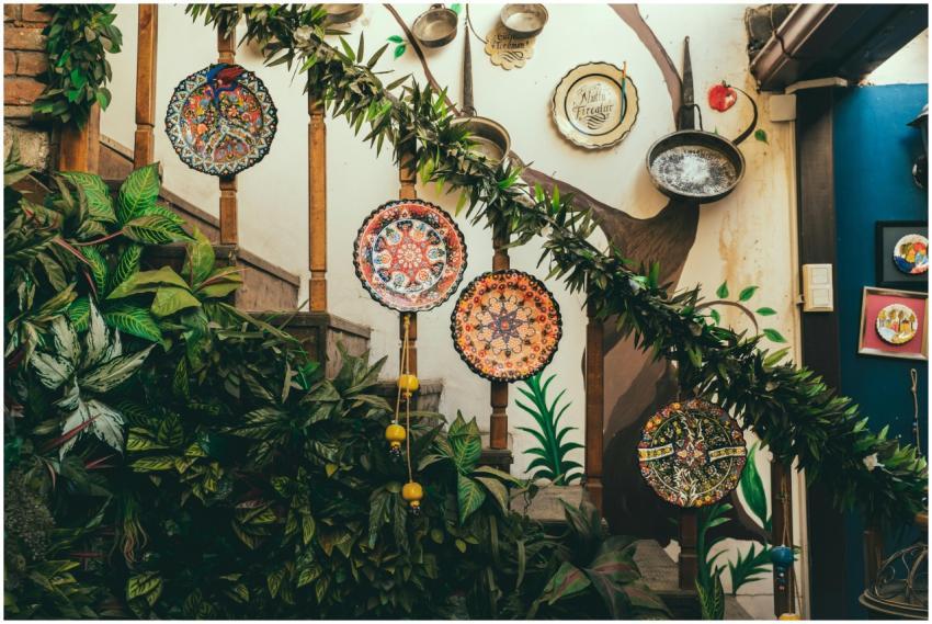 Vibrant patterned plates and lush greenery decorat