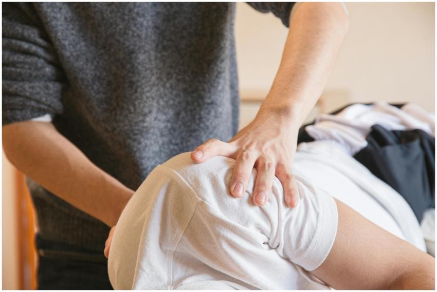 Close-up of a chiropractor performing shoulder the