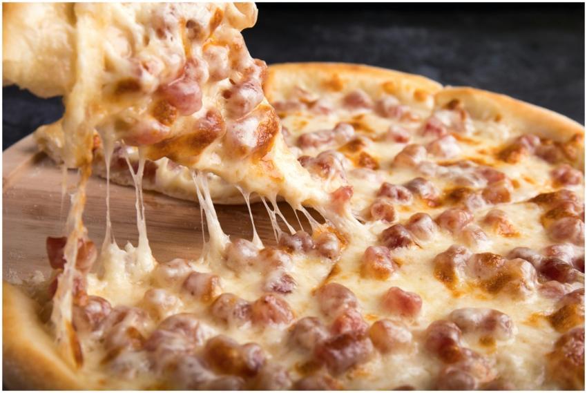 Close-up of a delicious pepperoni pizza slice with
