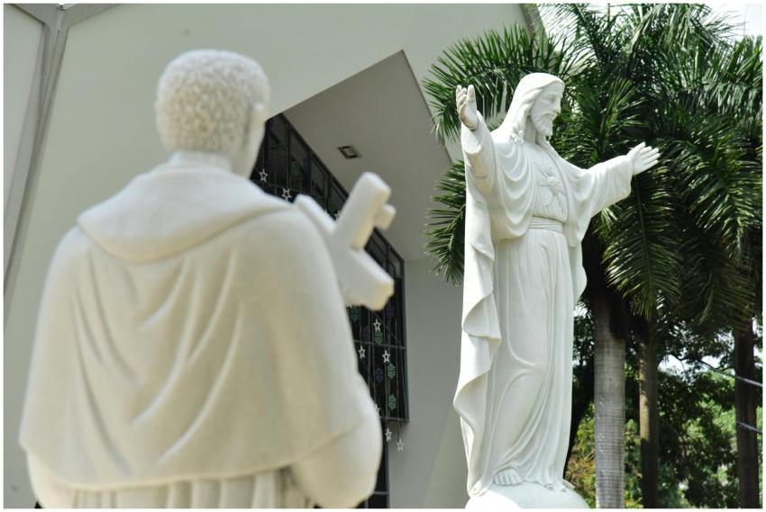 White stone statues of religious figures, includin