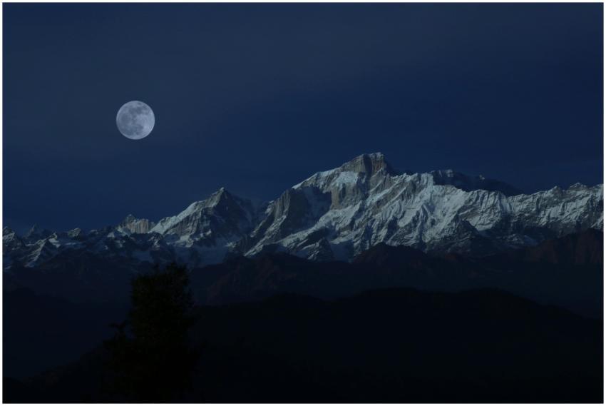Stunning view of snow-capped mountains illuminated