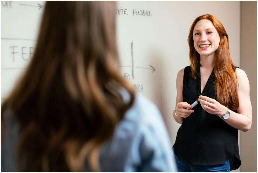 Two women discussing and planning a project in an