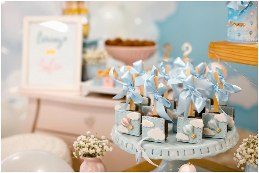 Elegant baby shower dessert table with pastel deco