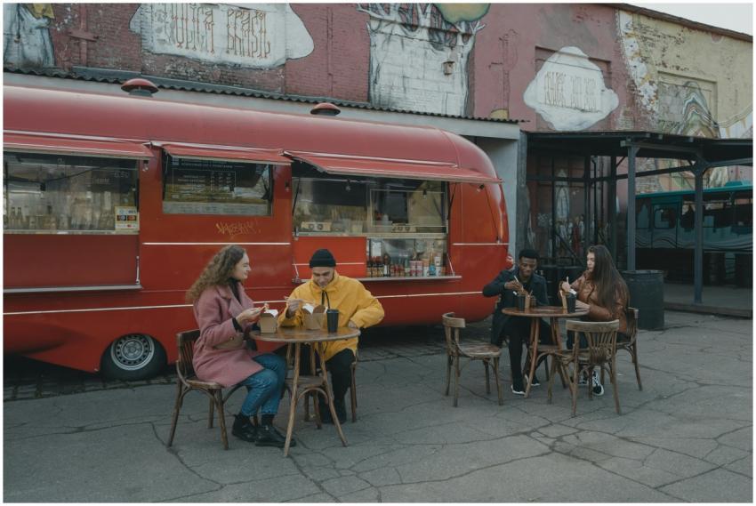 A group of friends enjoying casual dining outside