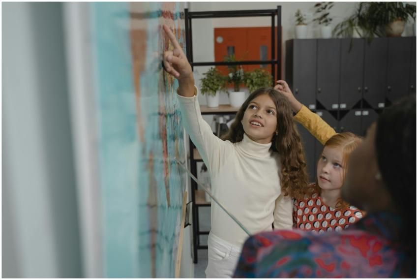 Children actively participate in a geography lesso