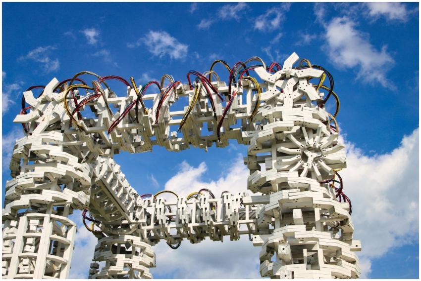 A complex white architectural structure with color