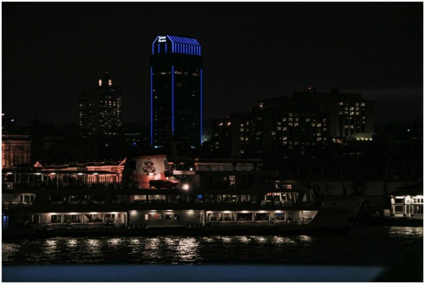Vibrant cityscape featuring glowing blue skyscrape