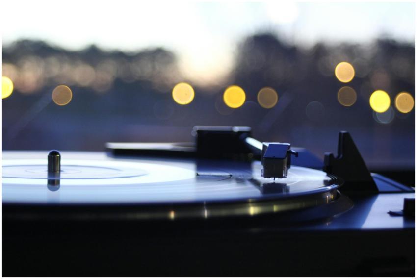 Close-up of a vintage turntable playing a vinyl re