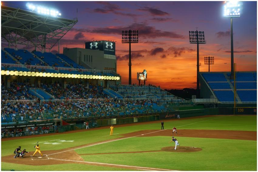 A vibrant baseball match in progress under stunnin
