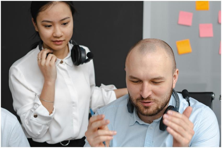 Colleagues collaborating in a modern office enviro
