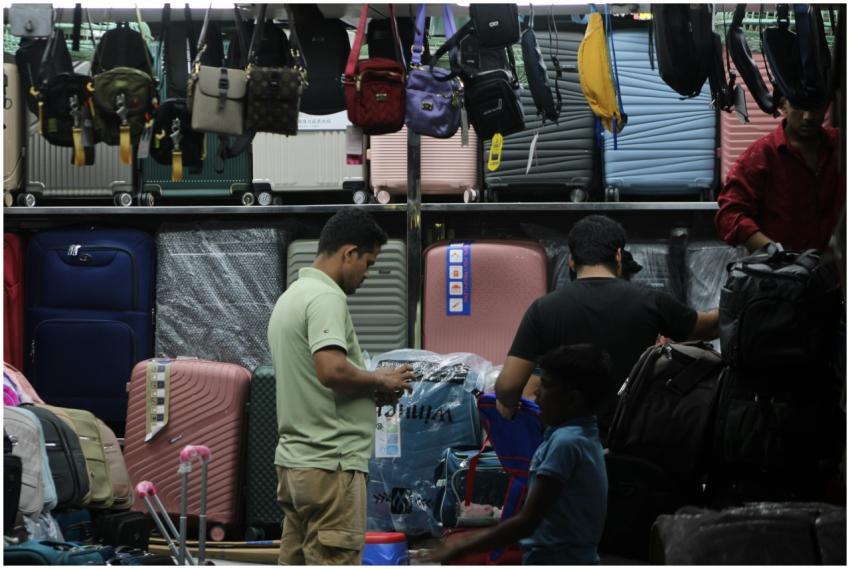 Busy Luggage Shop Scene